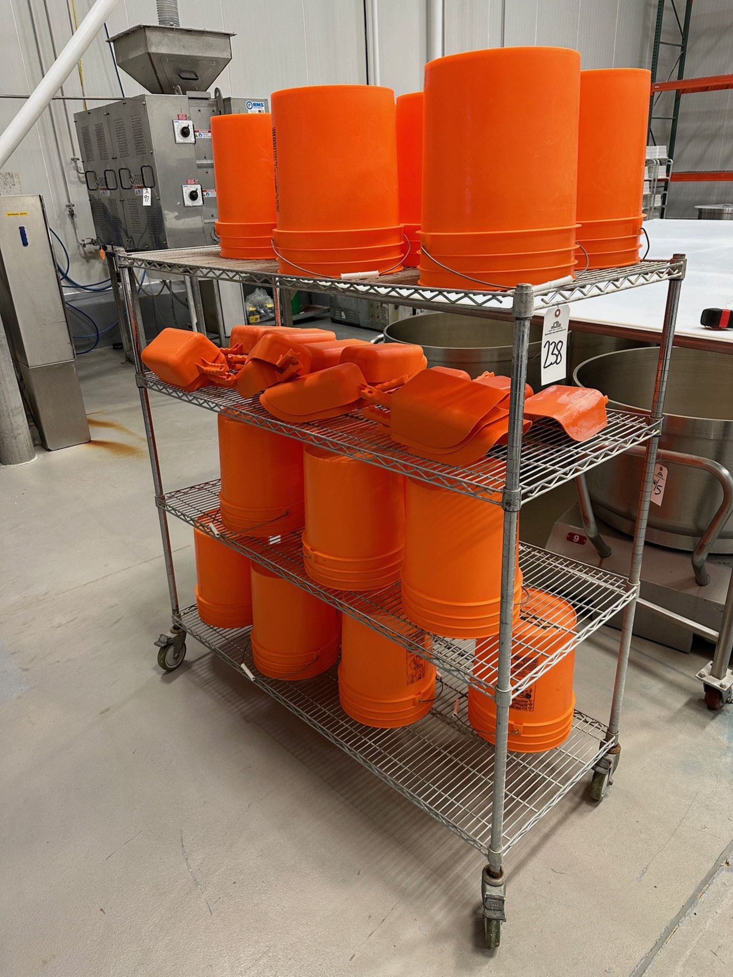 Lot of Orange Plastic Buckets and Scoops with Wire Shelving Unit (Approx. 5' x 2' x | Rig Fee $50
