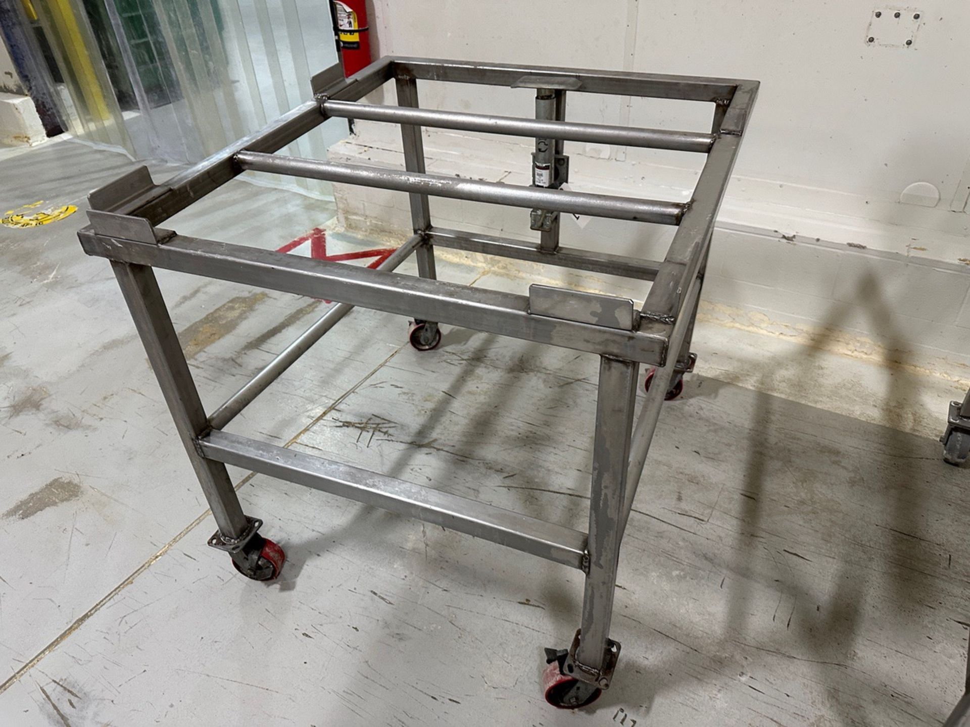 Stainless Steel Tote Stand with Hand Powered Tilting Jack | Rig Fee $25