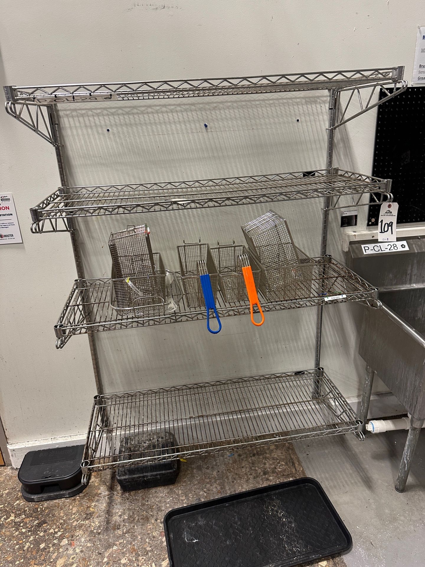 Lot of (2) 4-Shelf Wall Hung Wire Shelving Units (Approx. 4'x 18") and (1) 3' x 14" | Rig Fee $50