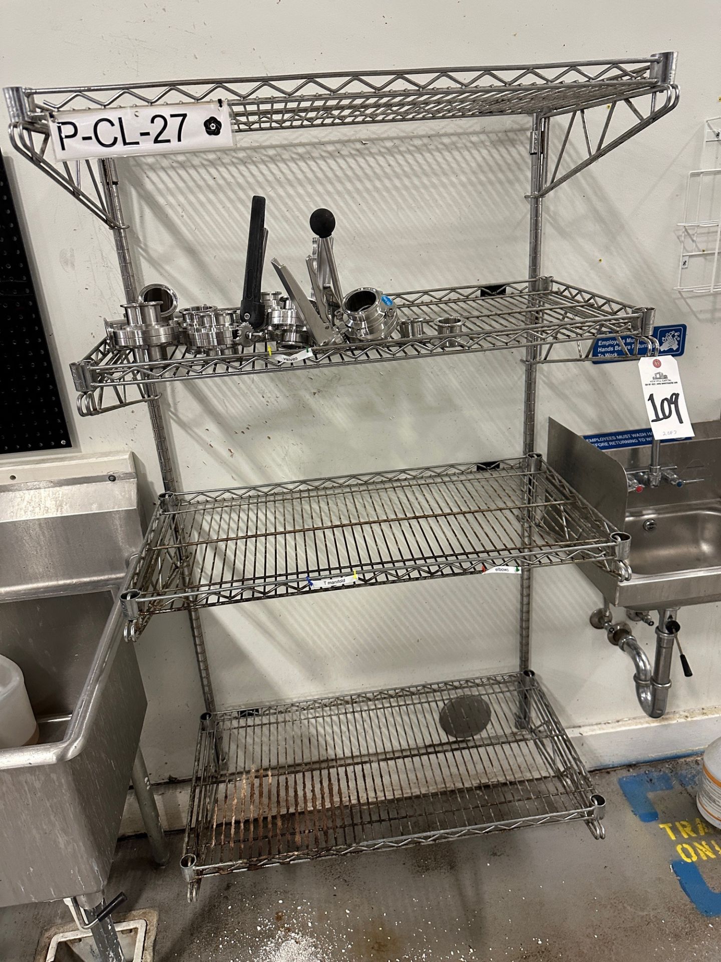 Lot of (2) 4-Shelf Wall Hung Wire Shelving Units (Approx. 4'x 18") and (1) 3' x 14" | Rig Fee $50 - Image 2 of 3