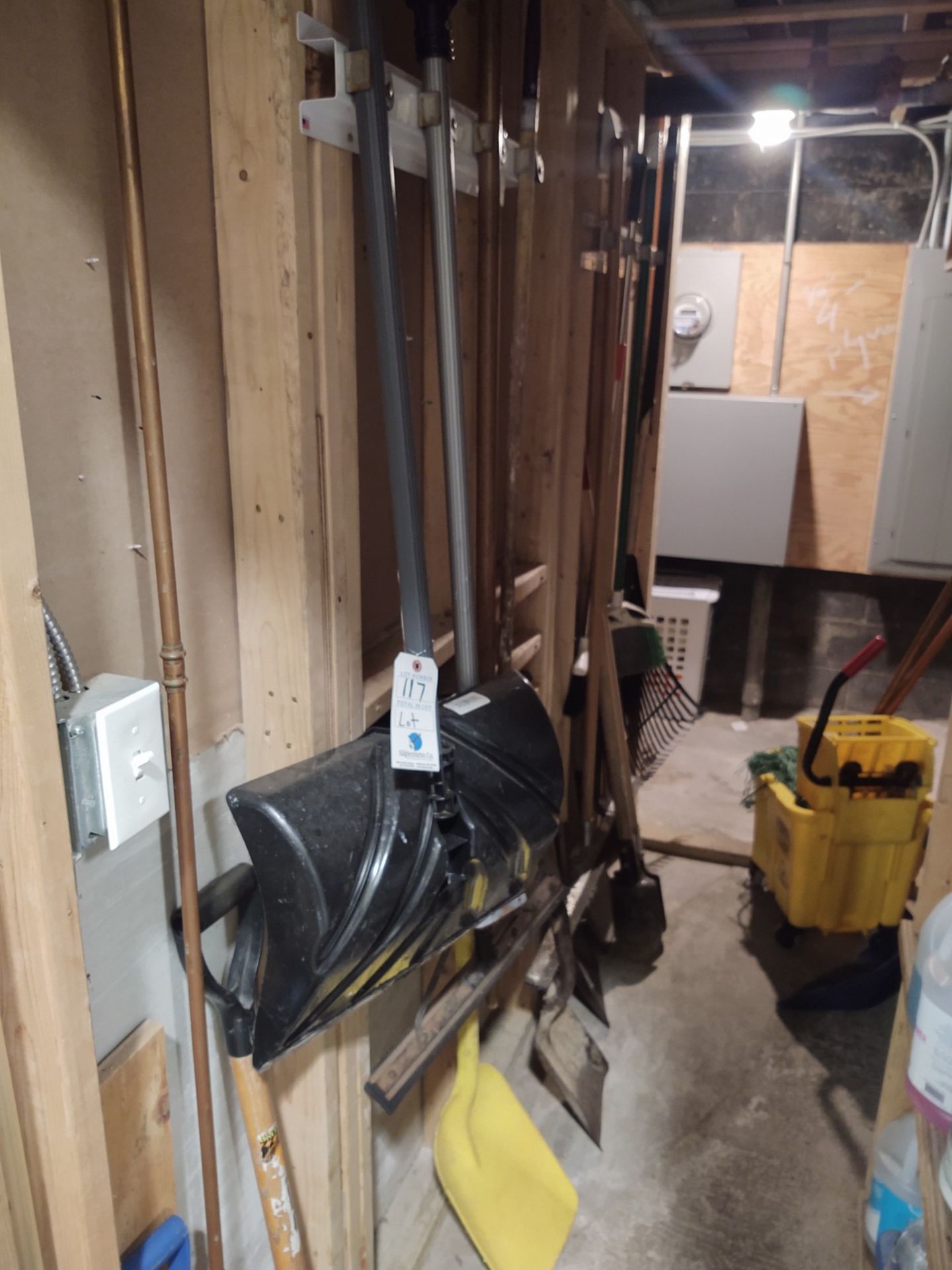 (Lot) Implements In Alcove c/o: Shovels, Brooms, Mops, In One Area