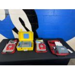 (4) Laerdal and Asst. AED Training Aids