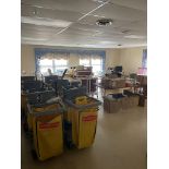{LOT} In Storage/Janitorial Area c/o: IPU Trash and Laundry Carts, Janitorial Carts, Kitchen Ware,