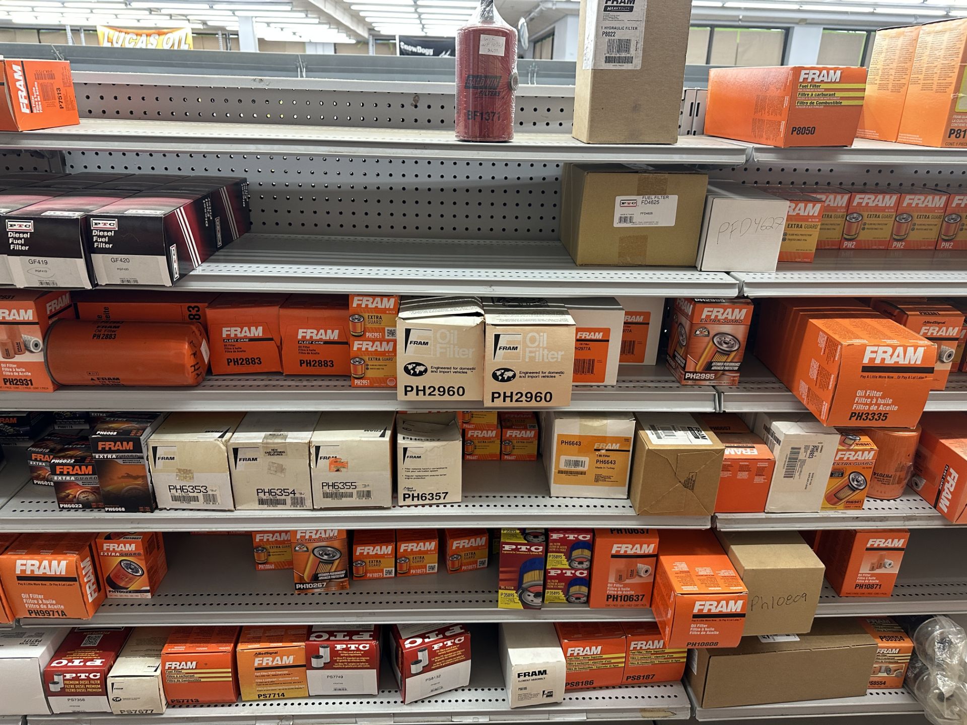 {LOT} Approx. 400 Fram & PTC Fuel Filters & Spin On Oil Filters on 7 Rows of Shelving (Retail Cost - Image 4 of 7