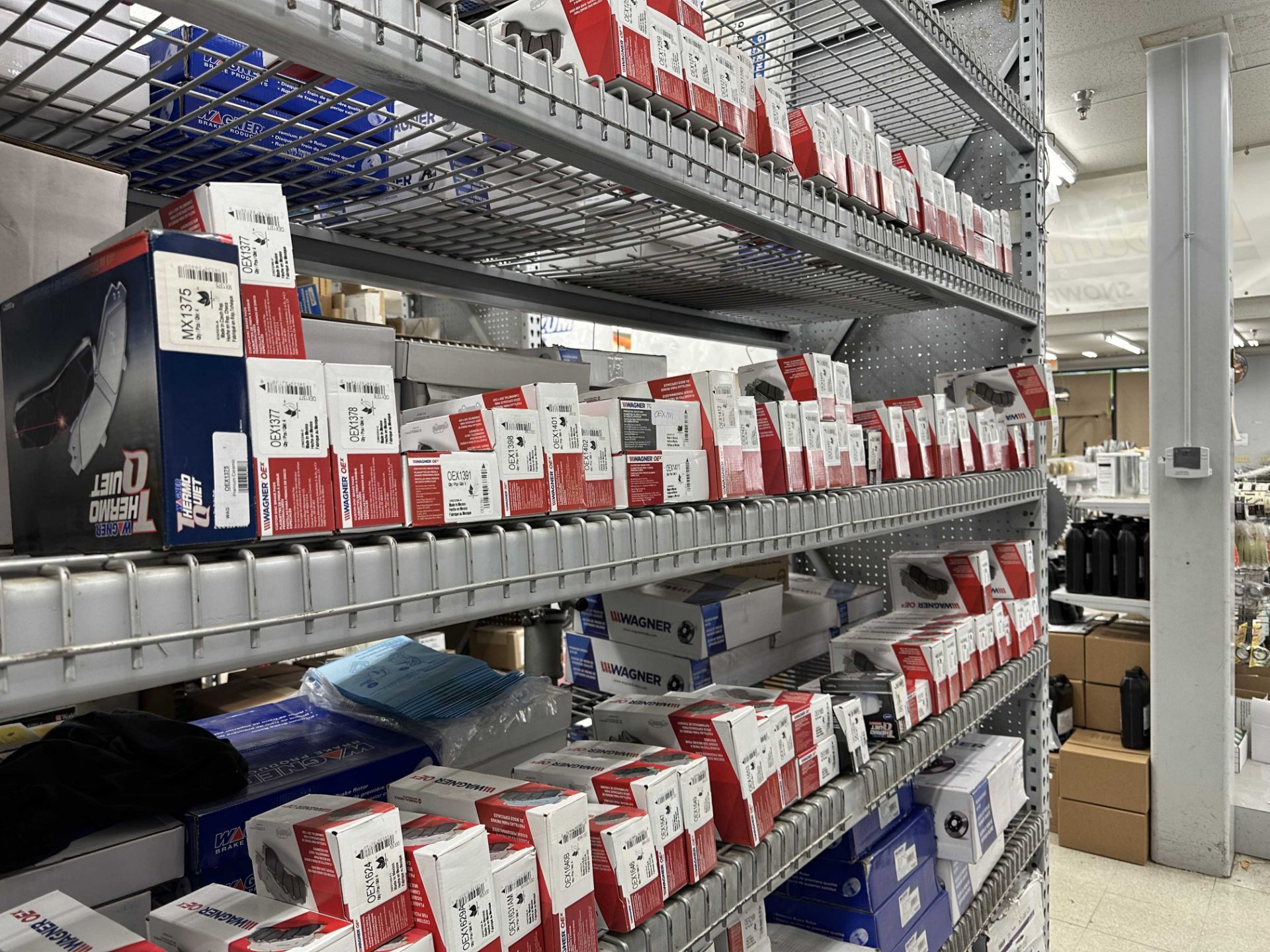 {LOT} Wagner OEX Brake Pads Appx. (198) Sets @ 5700 Wholesale Cost on ( 6) Shelves ( All Red Boxes ) - Image 2 of 2