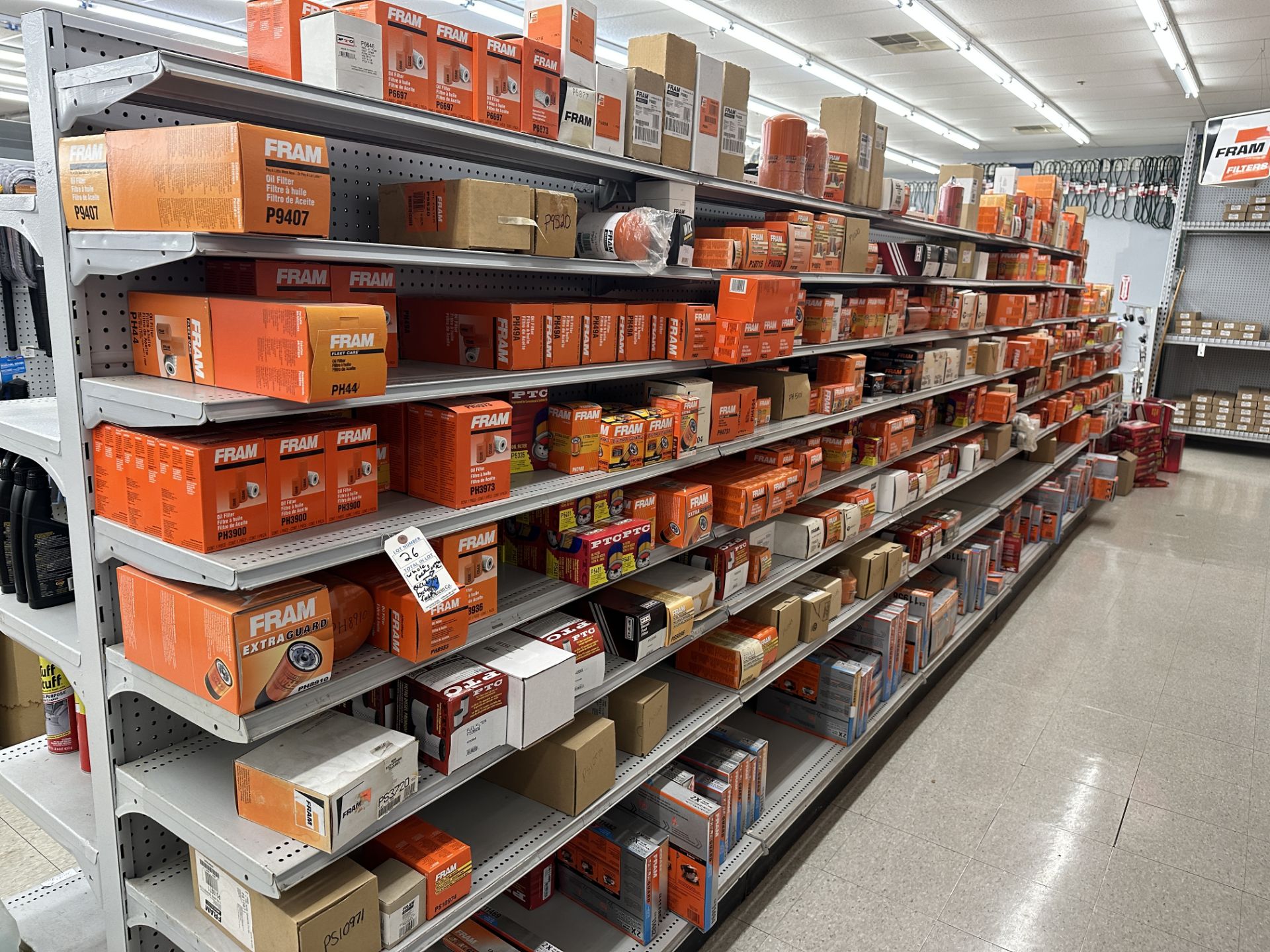 {LOT} Approx. 400 Fram & PTC Fuel Filters & Spin On Oil Filters on 7 Rows of Shelving (Retail Cost