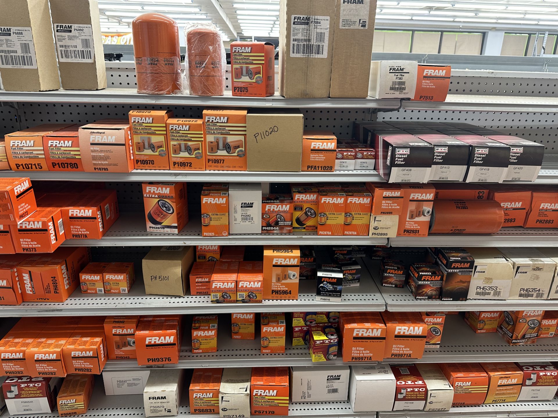 {LOT} Approx. 400 Fram & PTC Fuel Filters & Spin On Oil Filters on 7 Rows of Shelving (Retail Cost - Image 3 of 7