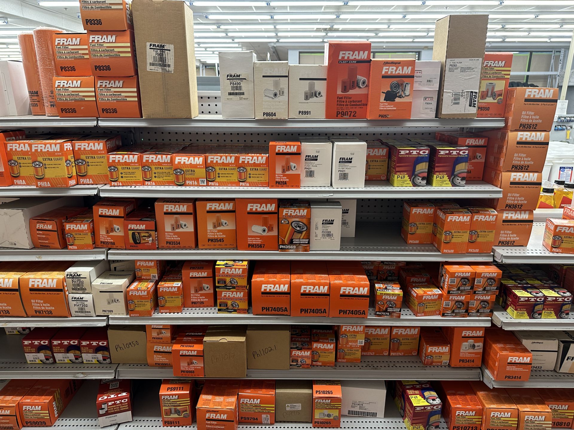 {LOT} Approx. 400 Fram & PTC Fuel Filters & Spin On Oil Filters on 7 Rows of Shelving (Retail Cost - Image 6 of 7