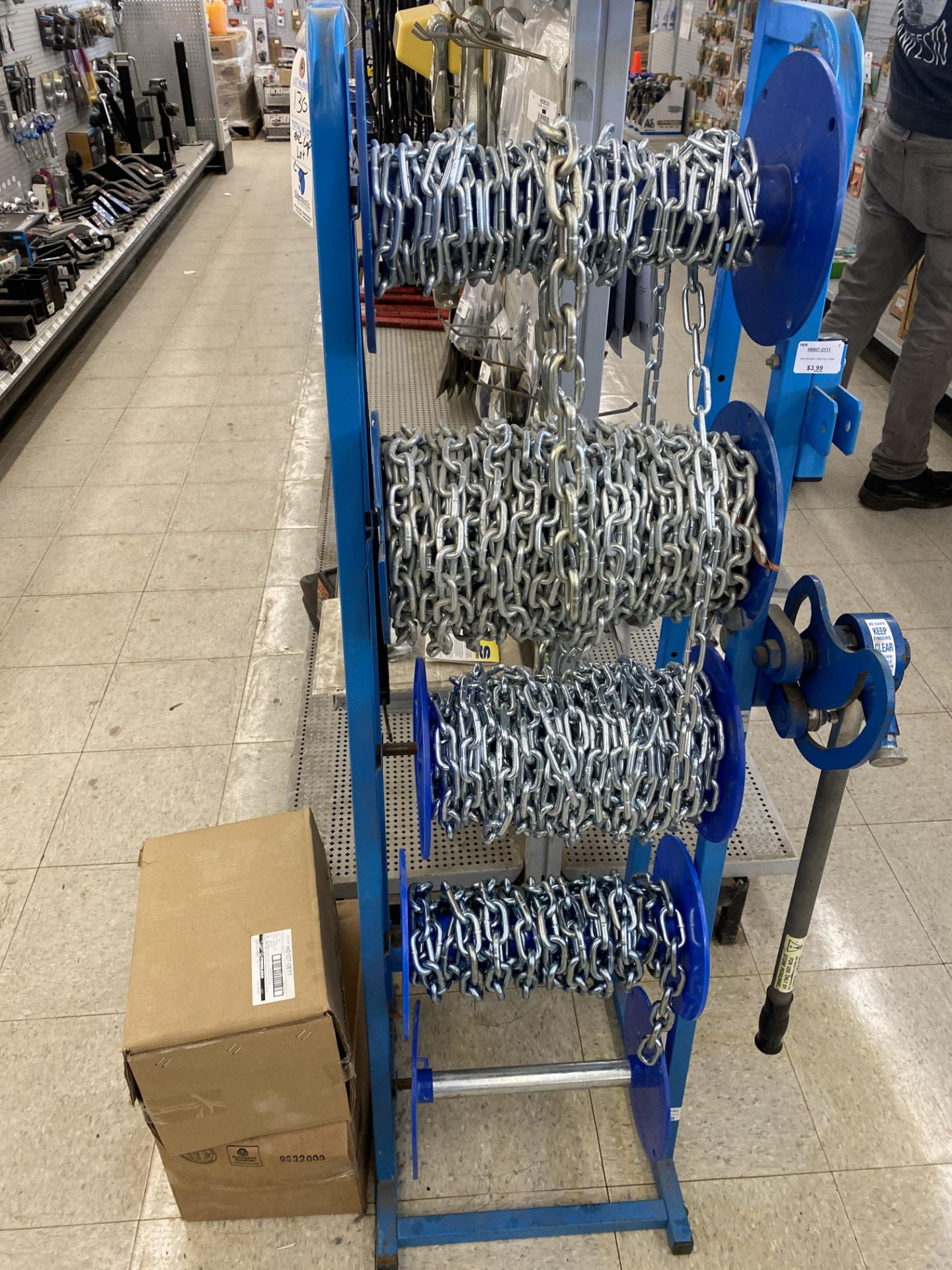 {LOT} Peerless 3/16", 1/4", and 5/16" Chains w/ D Rings and Hooks w/ Rack Wholesale Value 1000 - Image 2 of 6