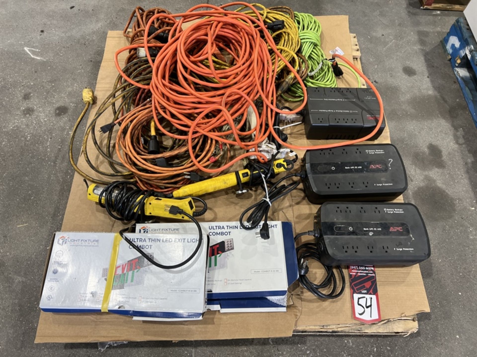 Lot of Assorted Extension Cords, Work Lights, Battery Back Ups and Lighted Exit Signs