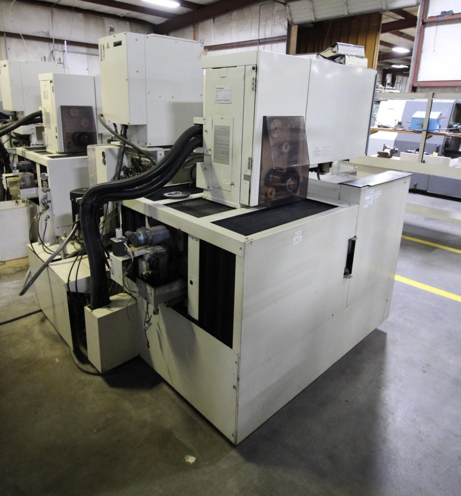 WIRE EDM MACHINE, MITSUBISHI MDL. FX-10, new 1997, 33.46”-X, 25.59”-Y, 8.6”-Z axis travels, 1,763 - Image 4 of 12