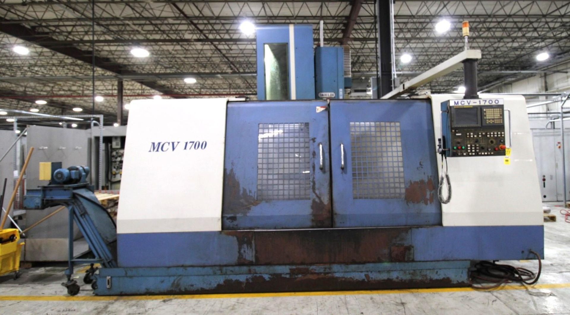 CNC VERTICAL MACHINING CENTER, DAHLIH MCV-1700, new 2006, Fanuc 21i-MB CNC control, 40” x 75” tbl.