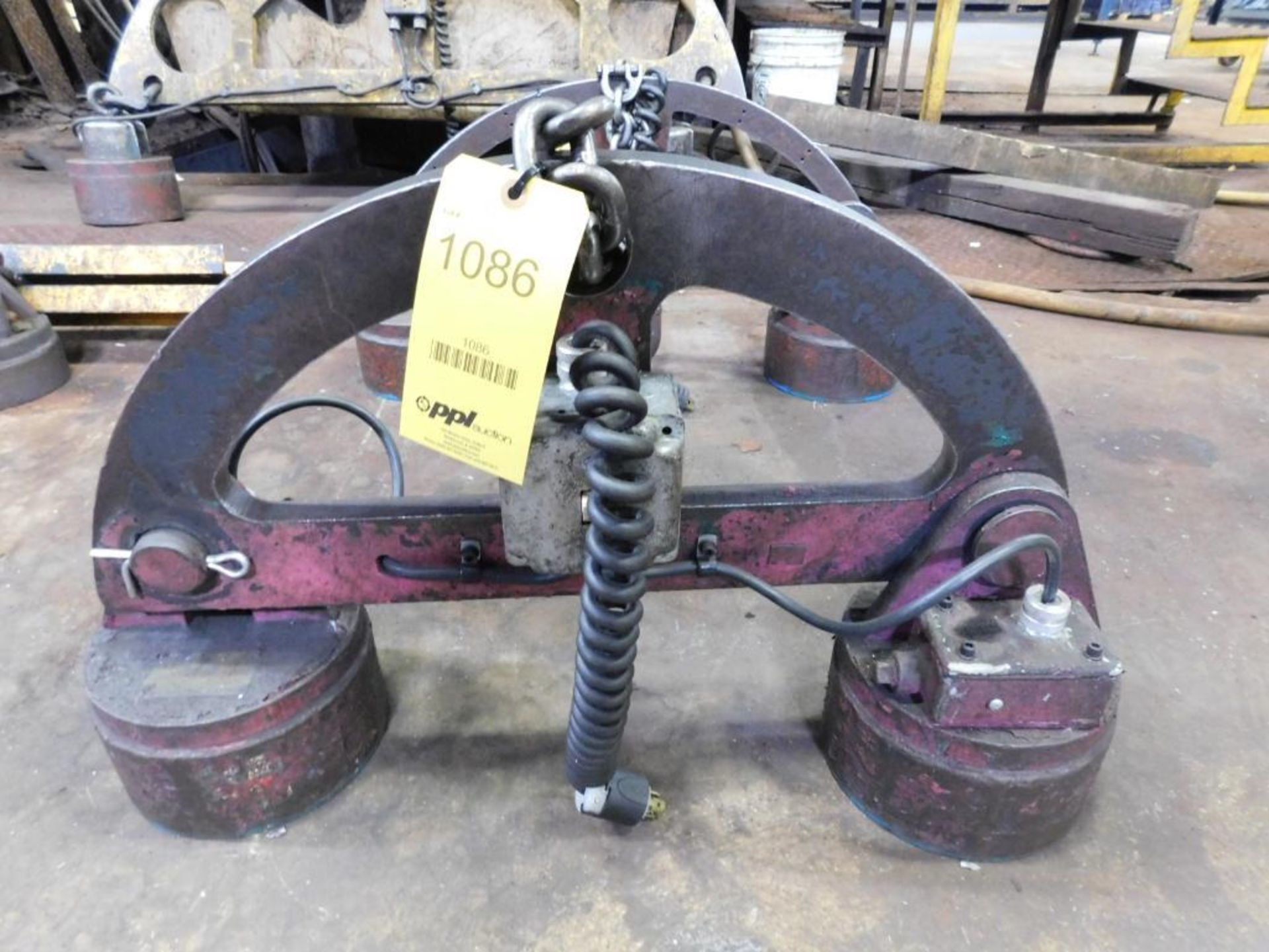 LOT: (2) 2,400 Lb. (approx.) Electromagnetic Lifting Magnets on Spreader Bar