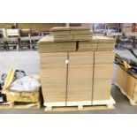 Large assortment of chipboard and boxes