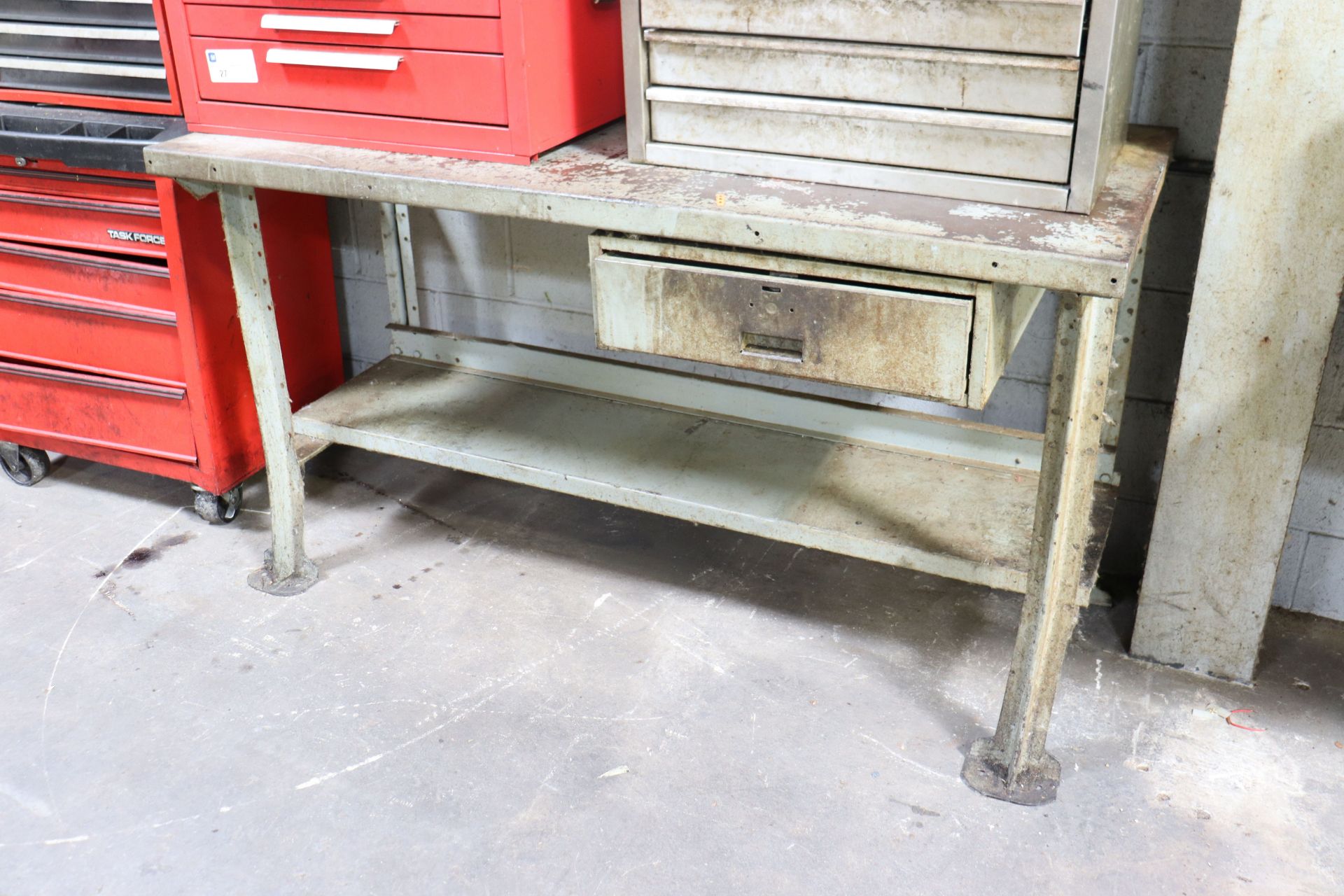 Metal table with drawer