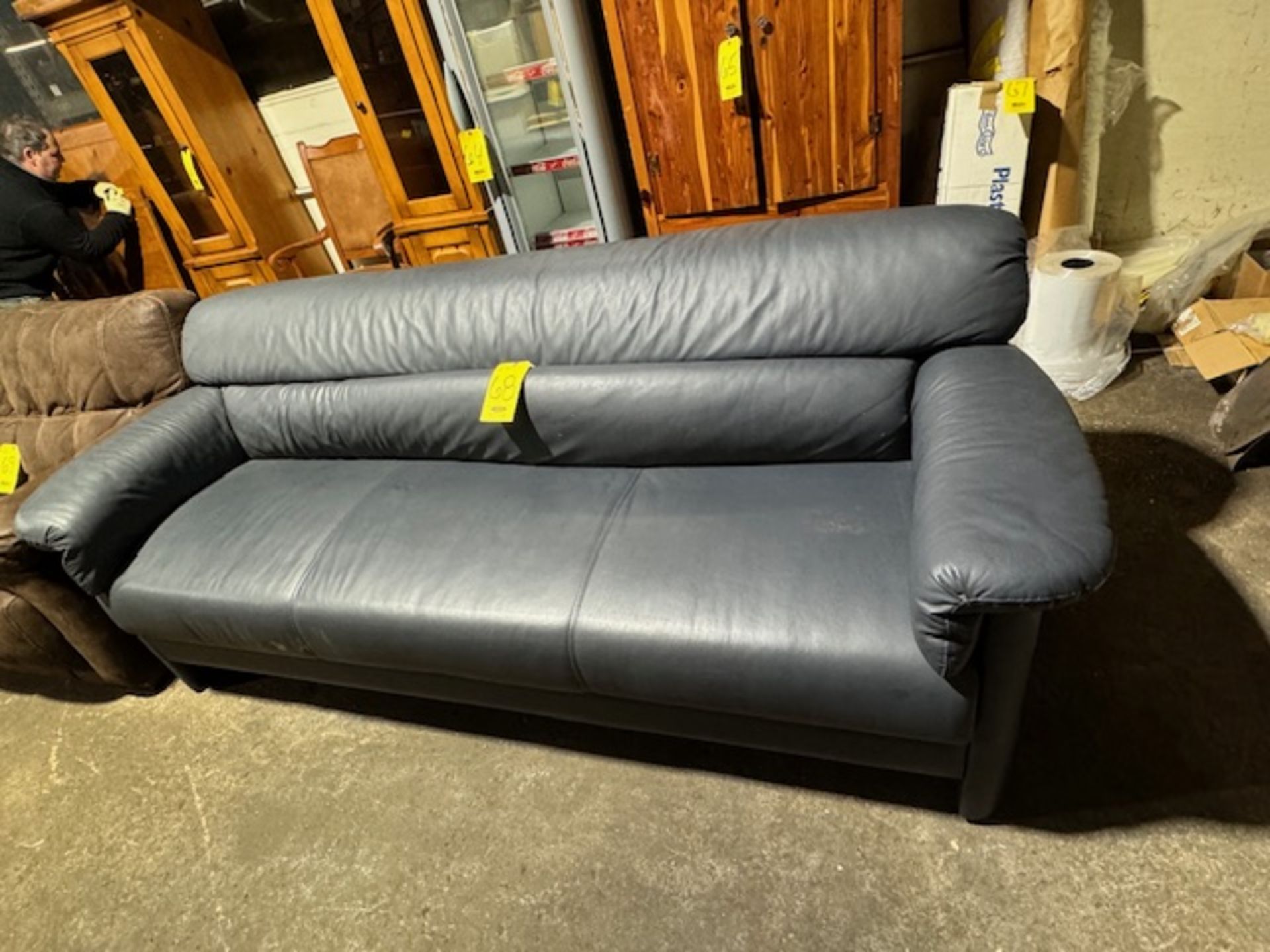 34 IN. X 88 IN. NAVY LEATHER SOFA (AS IS) (Located in Southampton, PA)