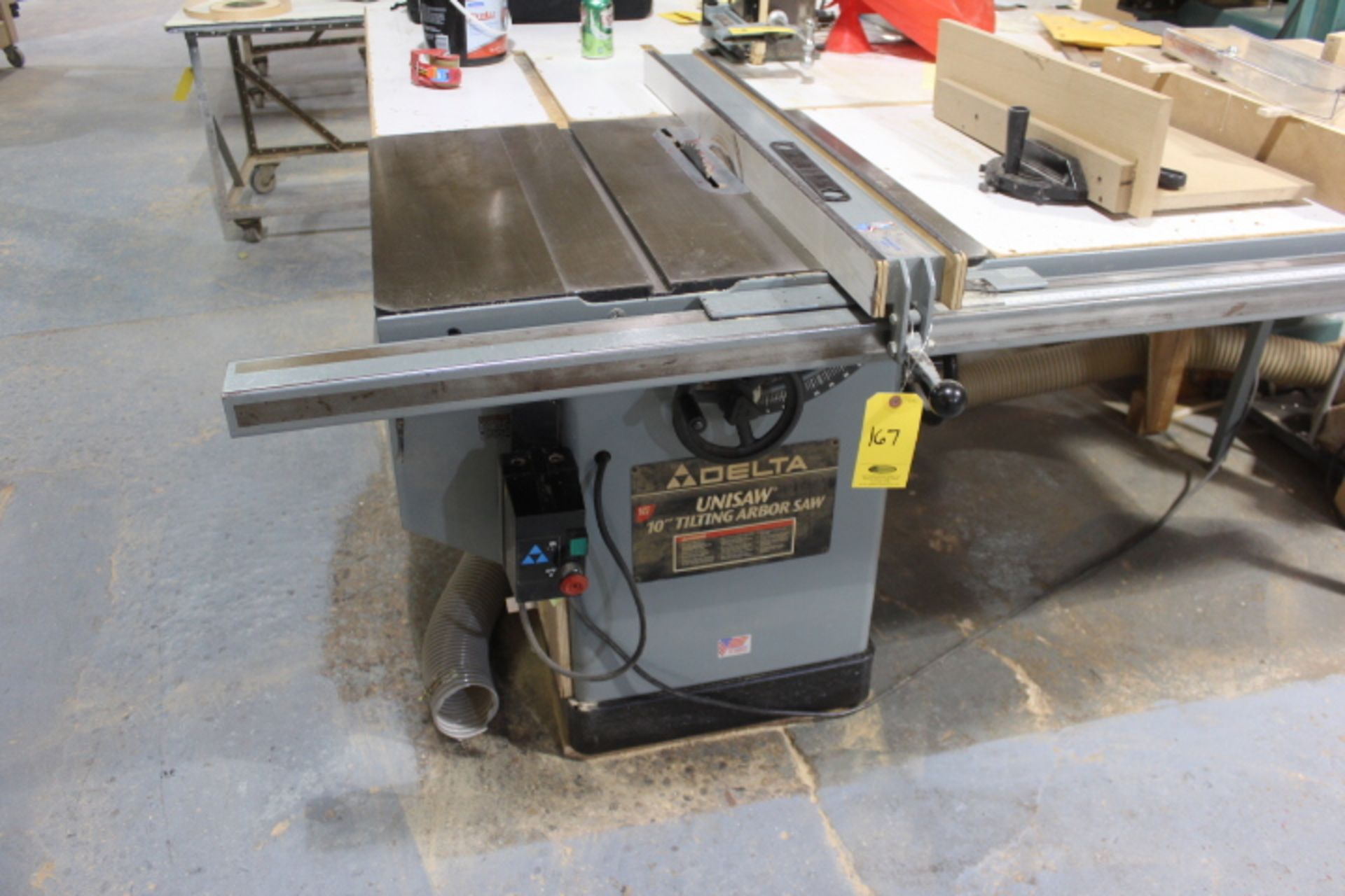 DELTA UNISAW 10 IN. TILTING ARBOR TABLE SAW, UNIFENCE, (LOADING FEE-$100)