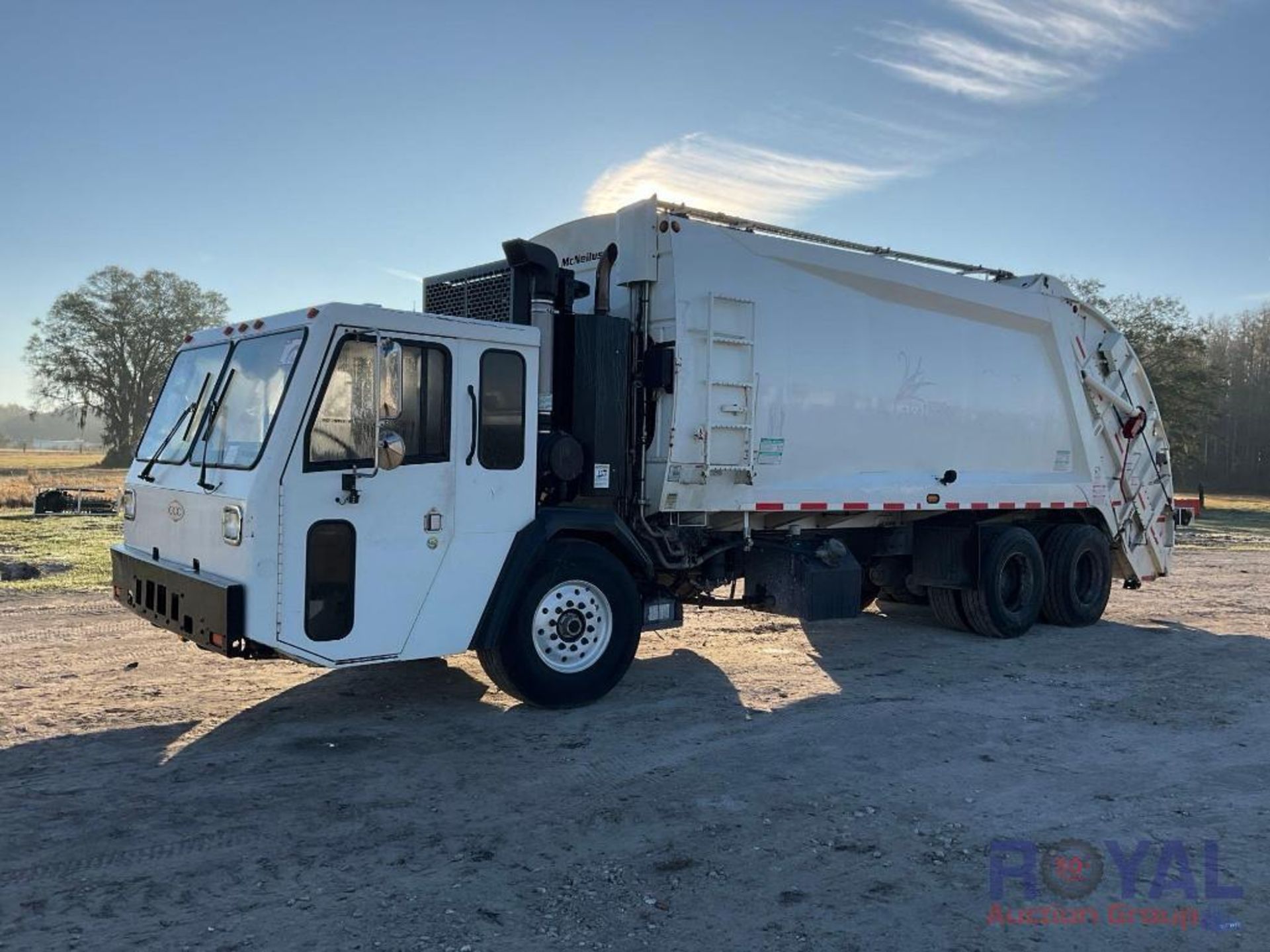 2015 Crane Carrier Co. McNeilus 3216 32 CuYd Rear Loader Garbage Truck