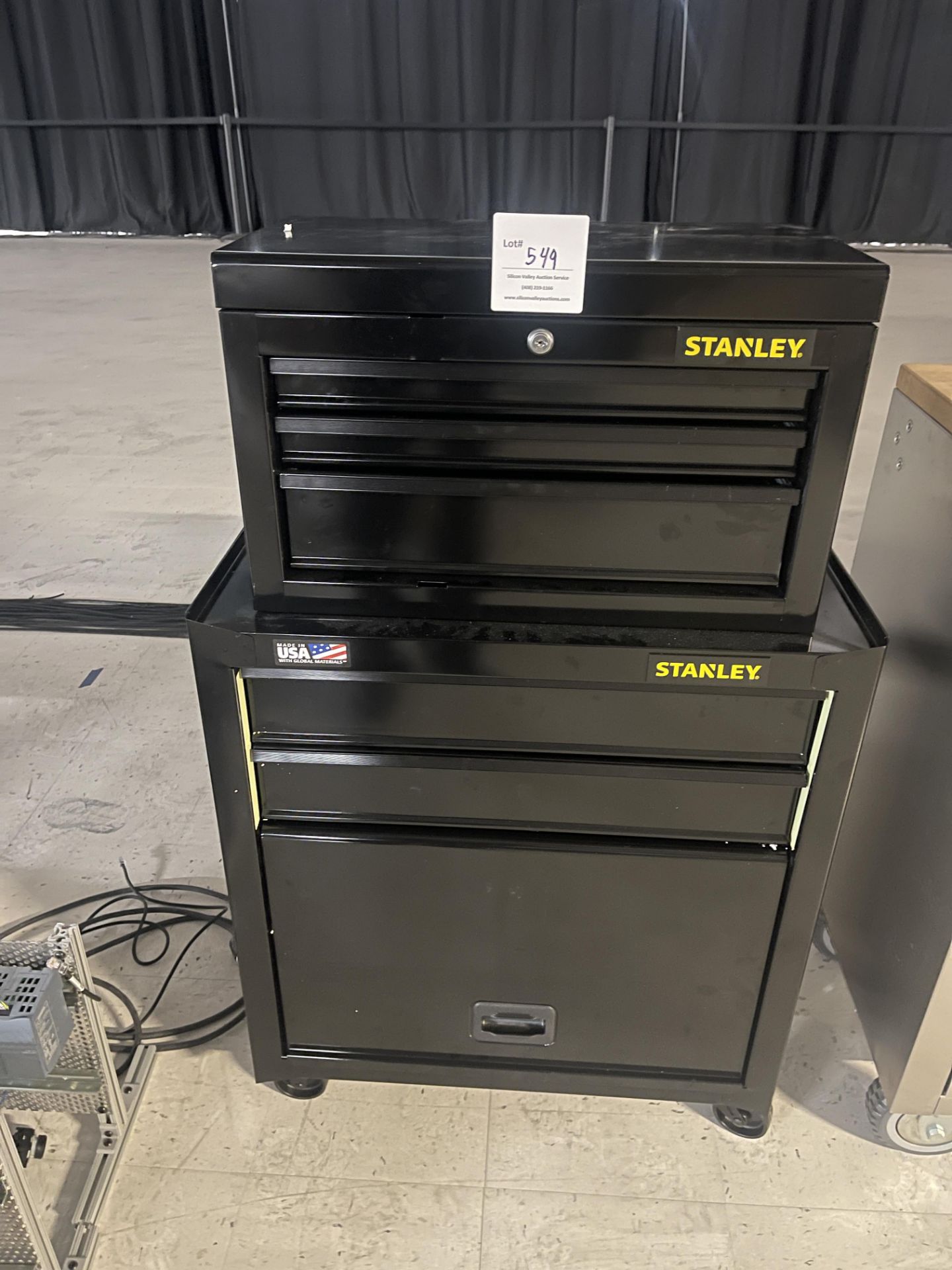 Stanley black tool chest and cart on wheels with five drawers and storage bin 27" wide x 14" deep