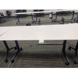 White Table on wheels 60" wide x 30" deep x 29" high