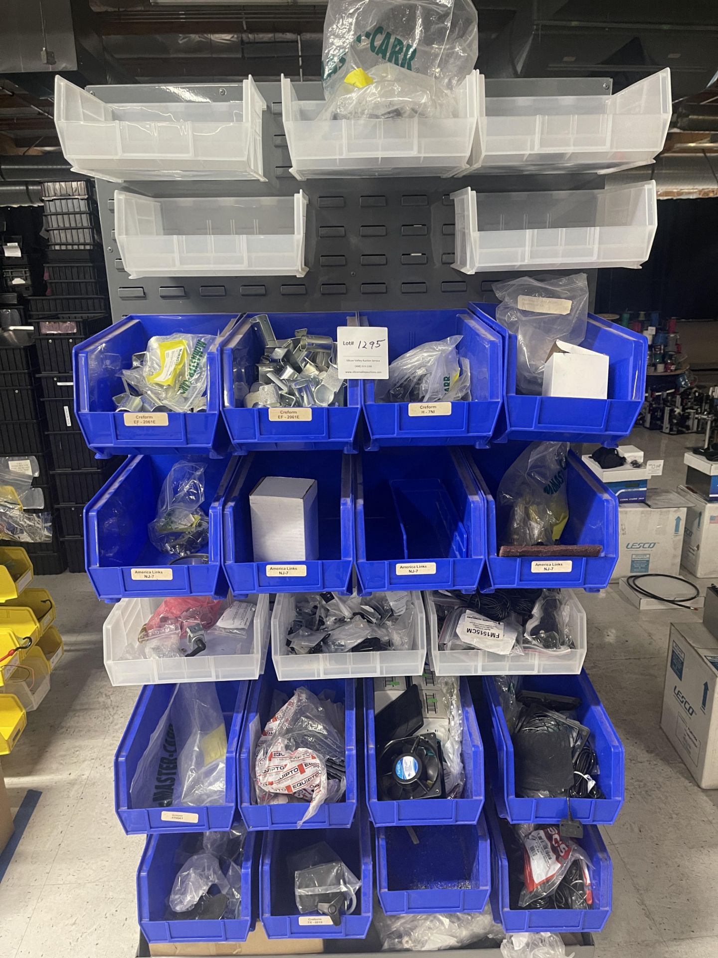 Storage rack with bins and contents