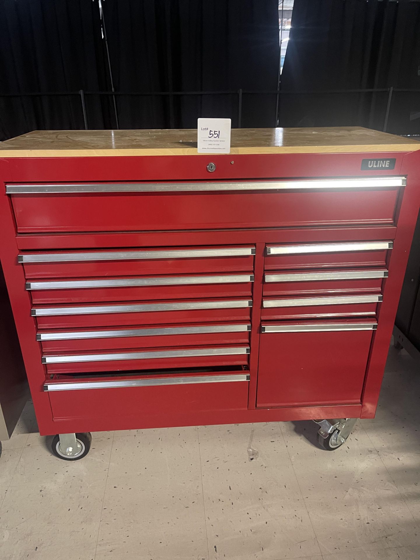 Uline red metal tool box on wheels with 11 drawers 42" wide x 18" deep x 40" high