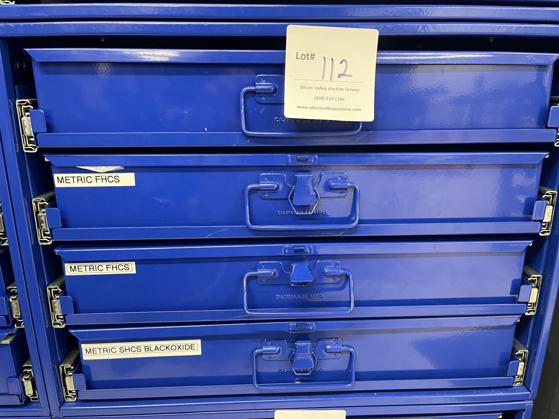 Durham Mfg blue metal storage cabinet with four drawers