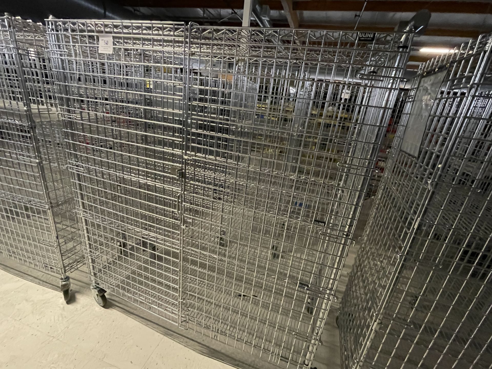 Wire Security Cage on wheels wth three shelves 60" wide x 25" deep x 70" high