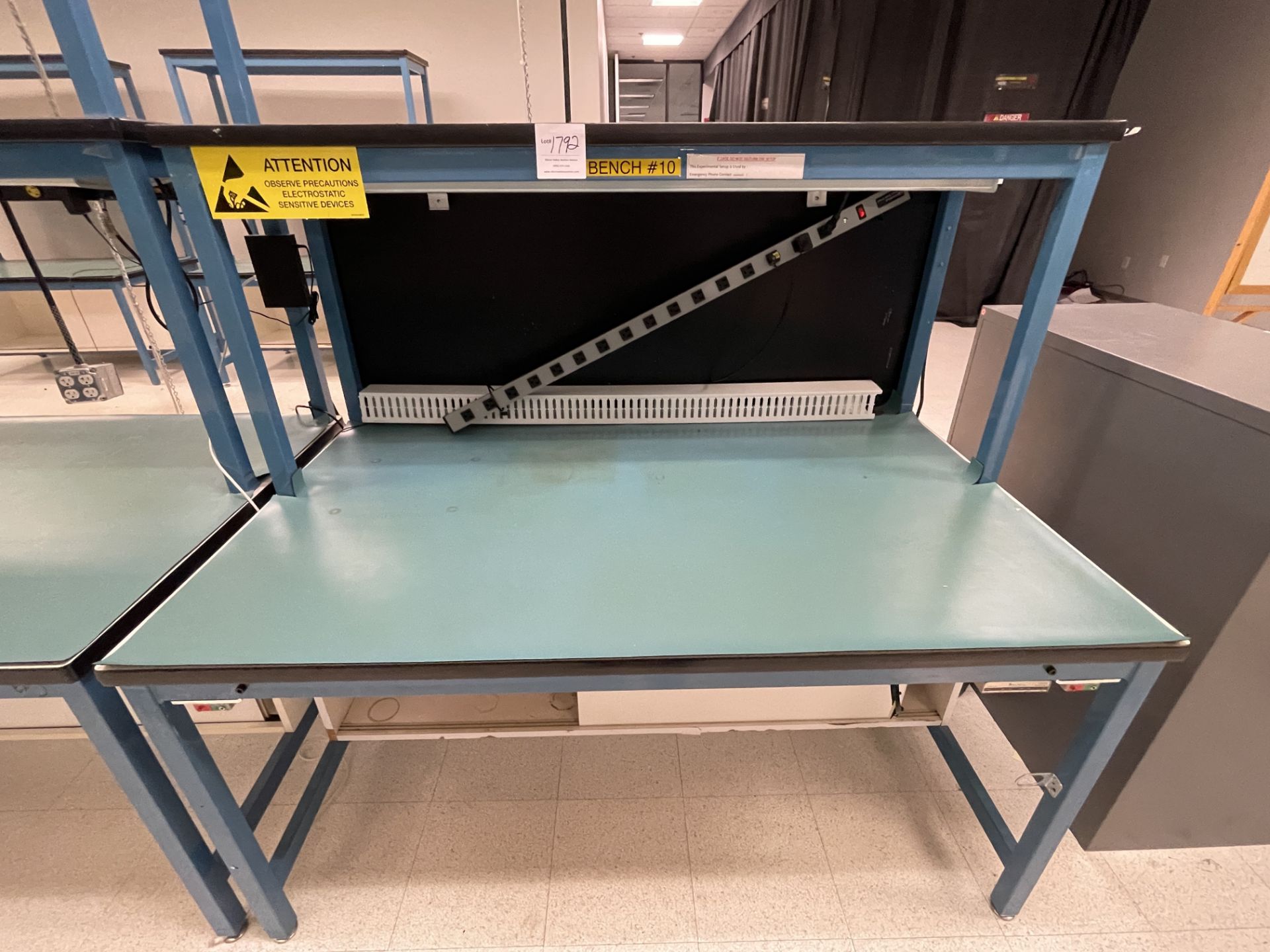 Blue Work Bench with one shelf and power strip
