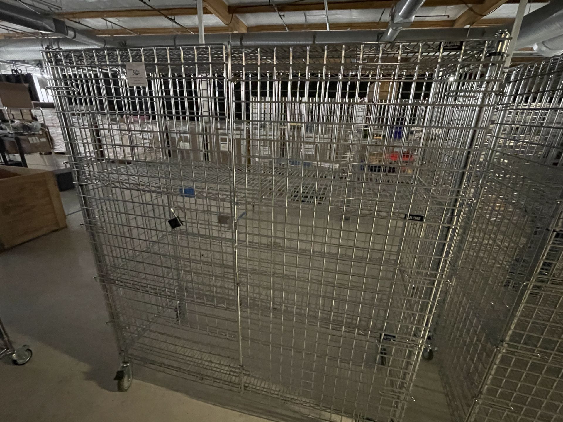 Wire Security Cage on wheels wth three shelves 60" wide x 25" deep x 70" high