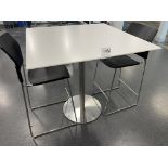 White Square Table with metal base 42" wide x 42" deep x 42" high and two black chairs