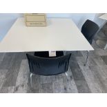White Square Table with metal base 42" wide x 42" deep x 30" high and one black chair (box on