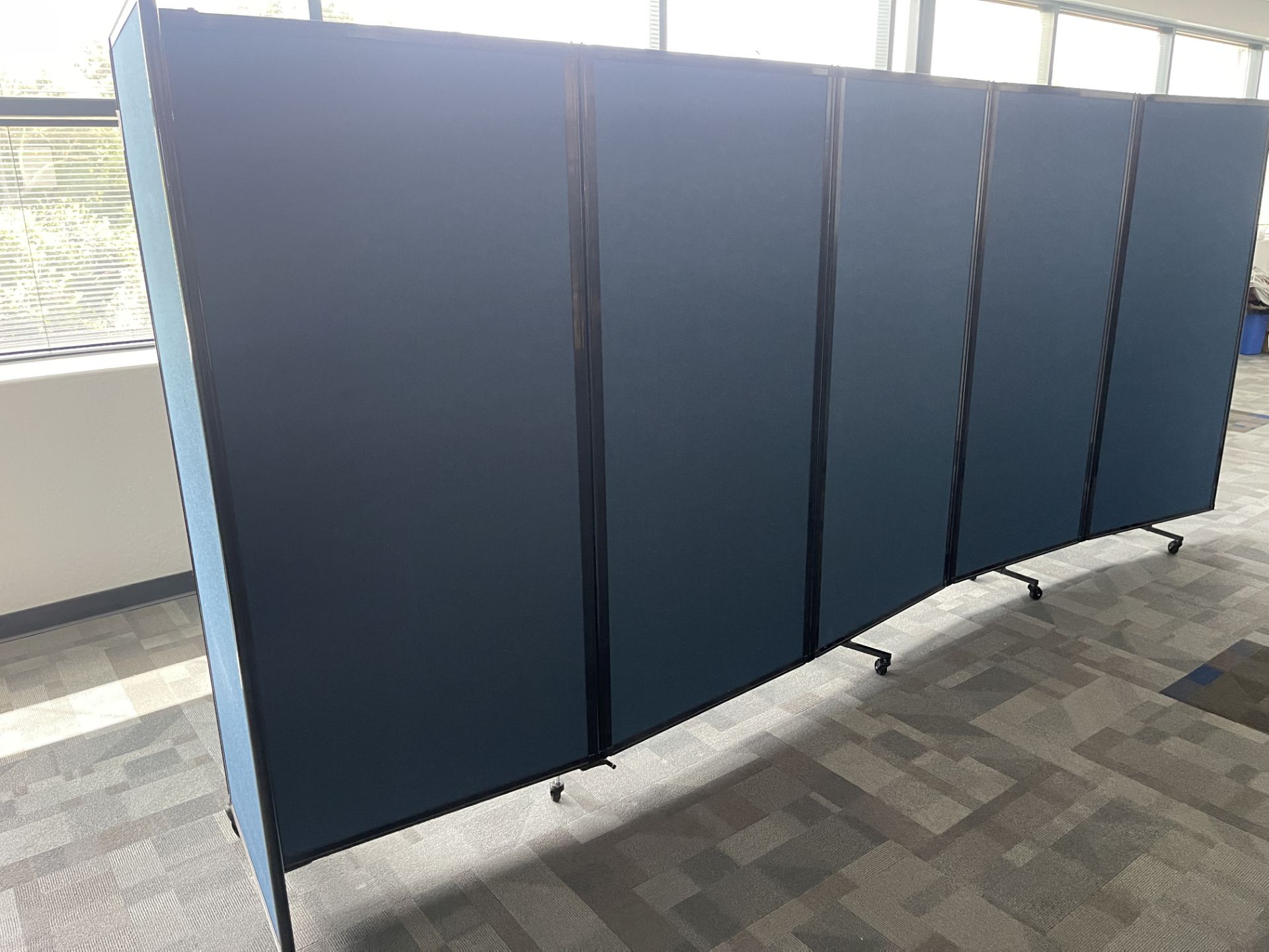 Three Blue Partitions on wheels