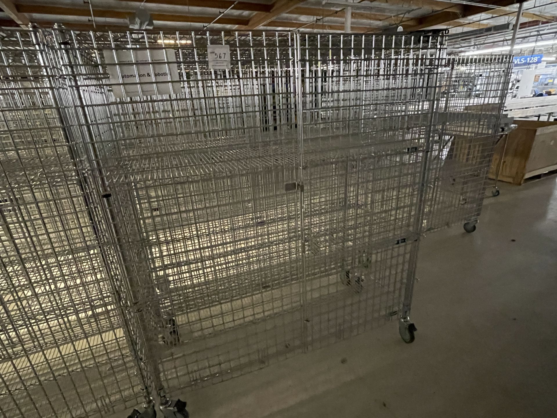 Wire Security Cage on wheels wth three shelves 60" wide x 25" deep x 70" high