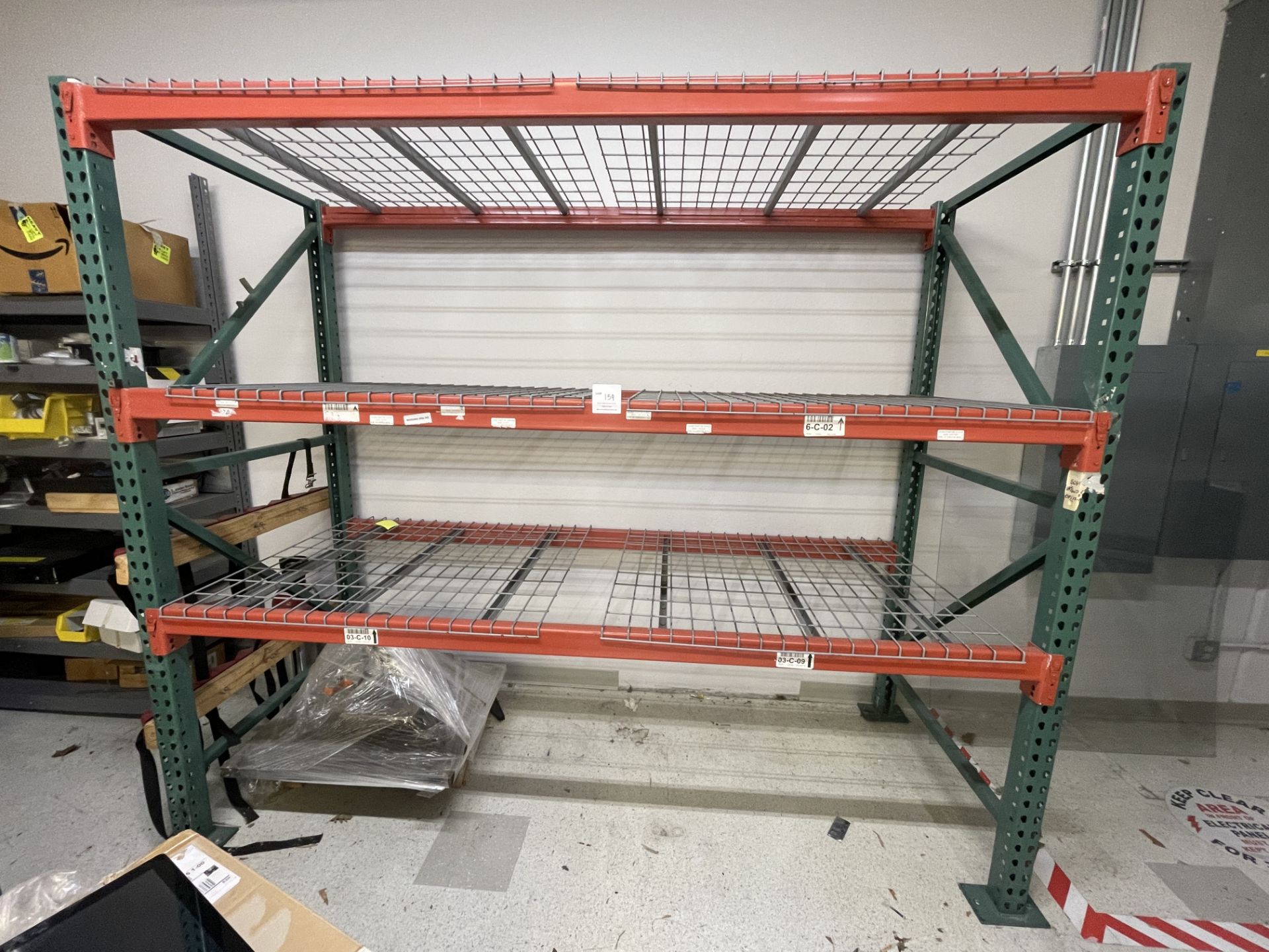 Pallet Racking, red and green metal with three shelves 96" wide x 90" tall x 42" deep