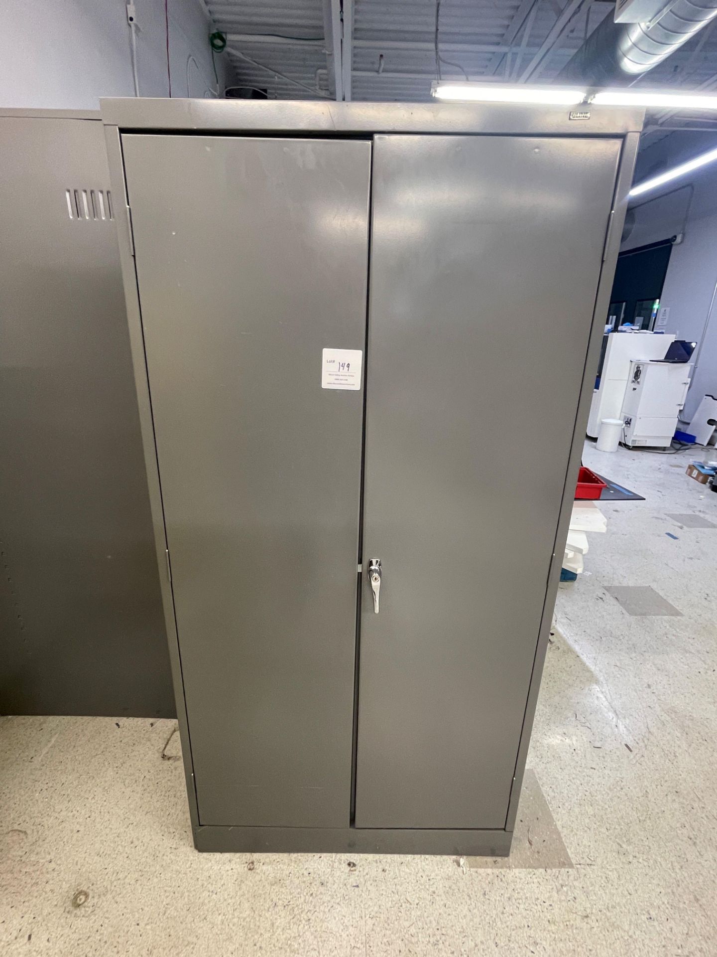 Grey metal storage cabinet with two doors 36" wide x 18" deep x 72" high