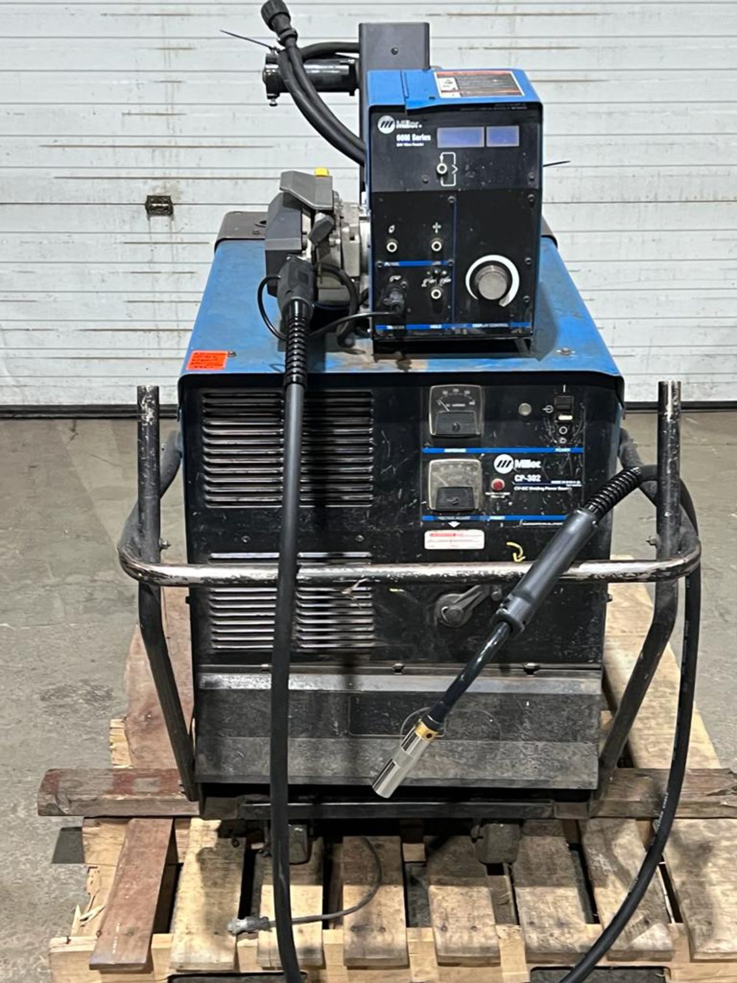 Miller CP-302 Mig Welder 300 Amp Mig with 60 Series 4-Wheel Wire Feeder with Mig Gun and cables