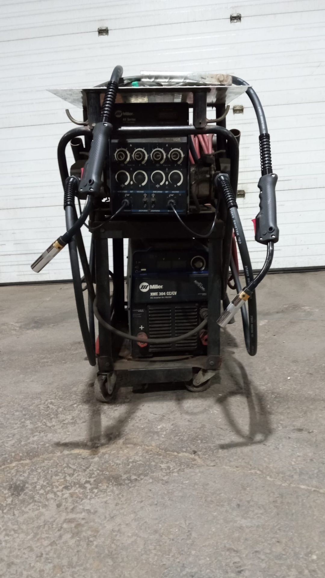 Miller XMT 304 CC/CV DC Inverter Multi Process Welder with DUAL 4-Wheel 60 Serial Feeder with mig