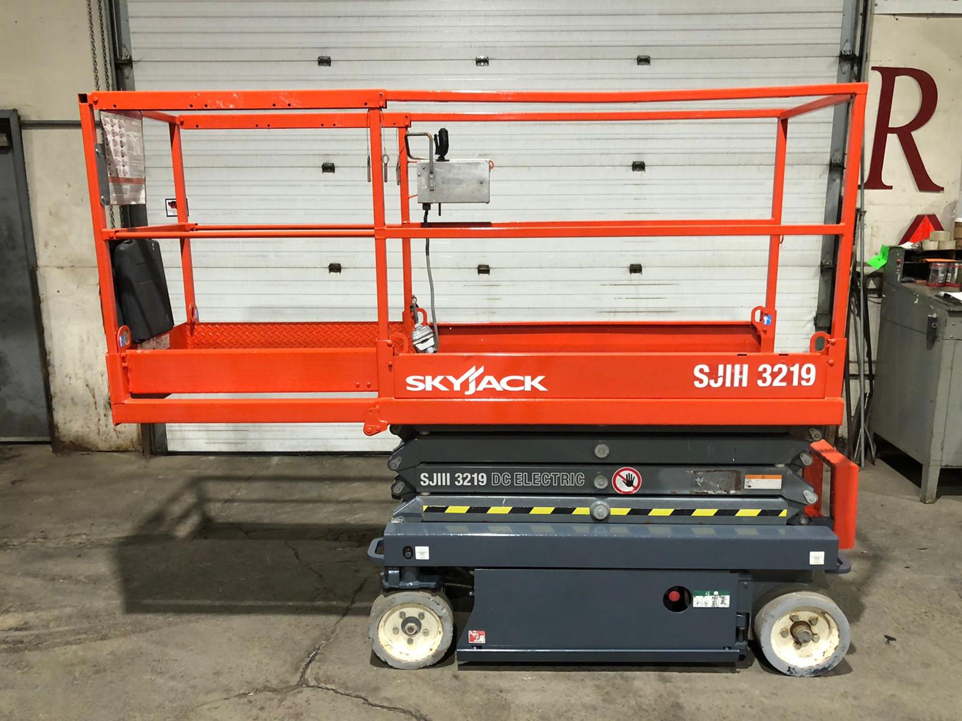 2013 SkyJack III Electric Scissor Lift model 3219 - 19 feet lift, 32 inch width deck with pendant - Image 2 of 3