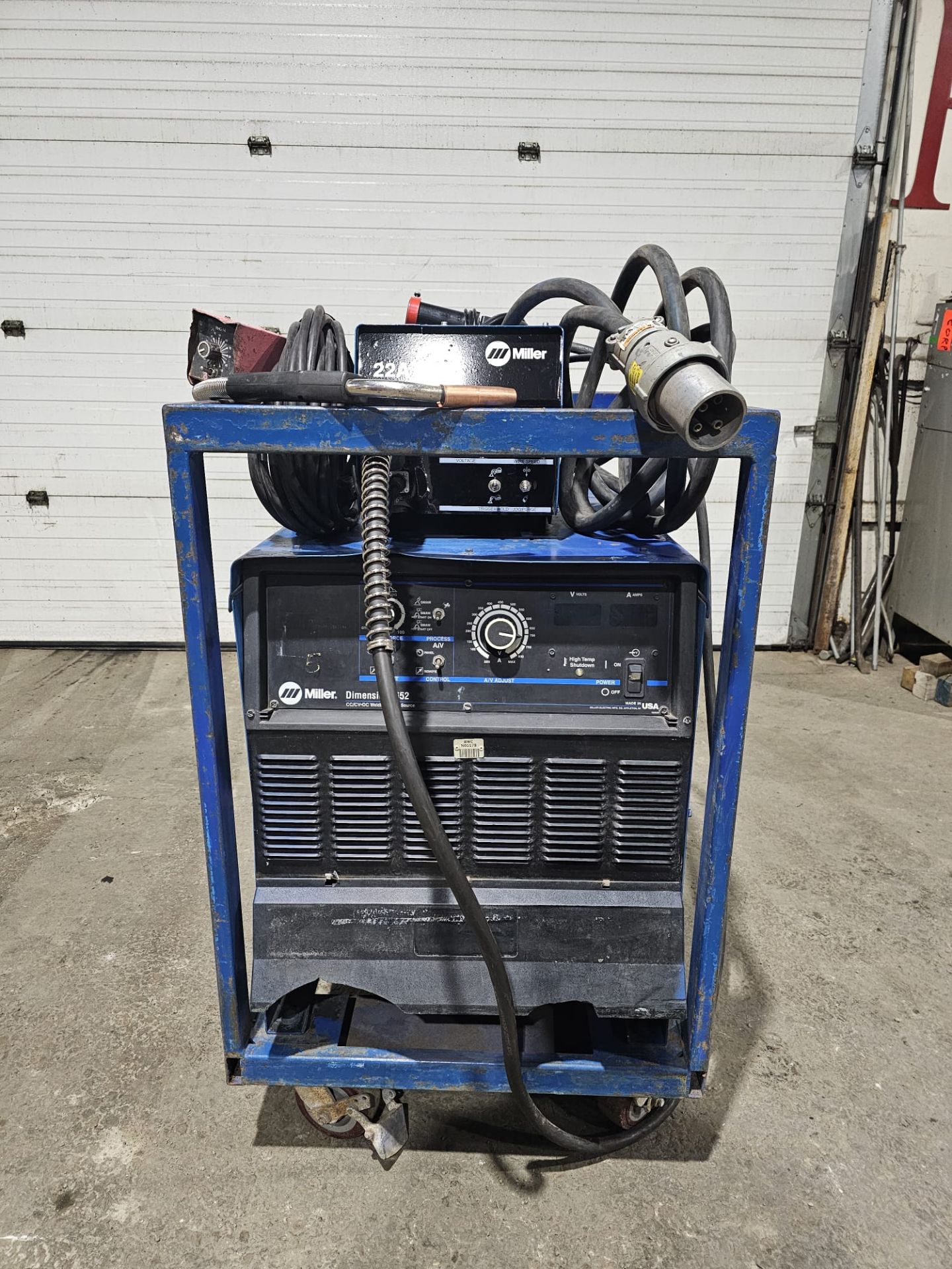 Miller Dimension 652 Mig Welder 650 Amp Mig Tig Stick Multi Process Power Source with 22A Wire