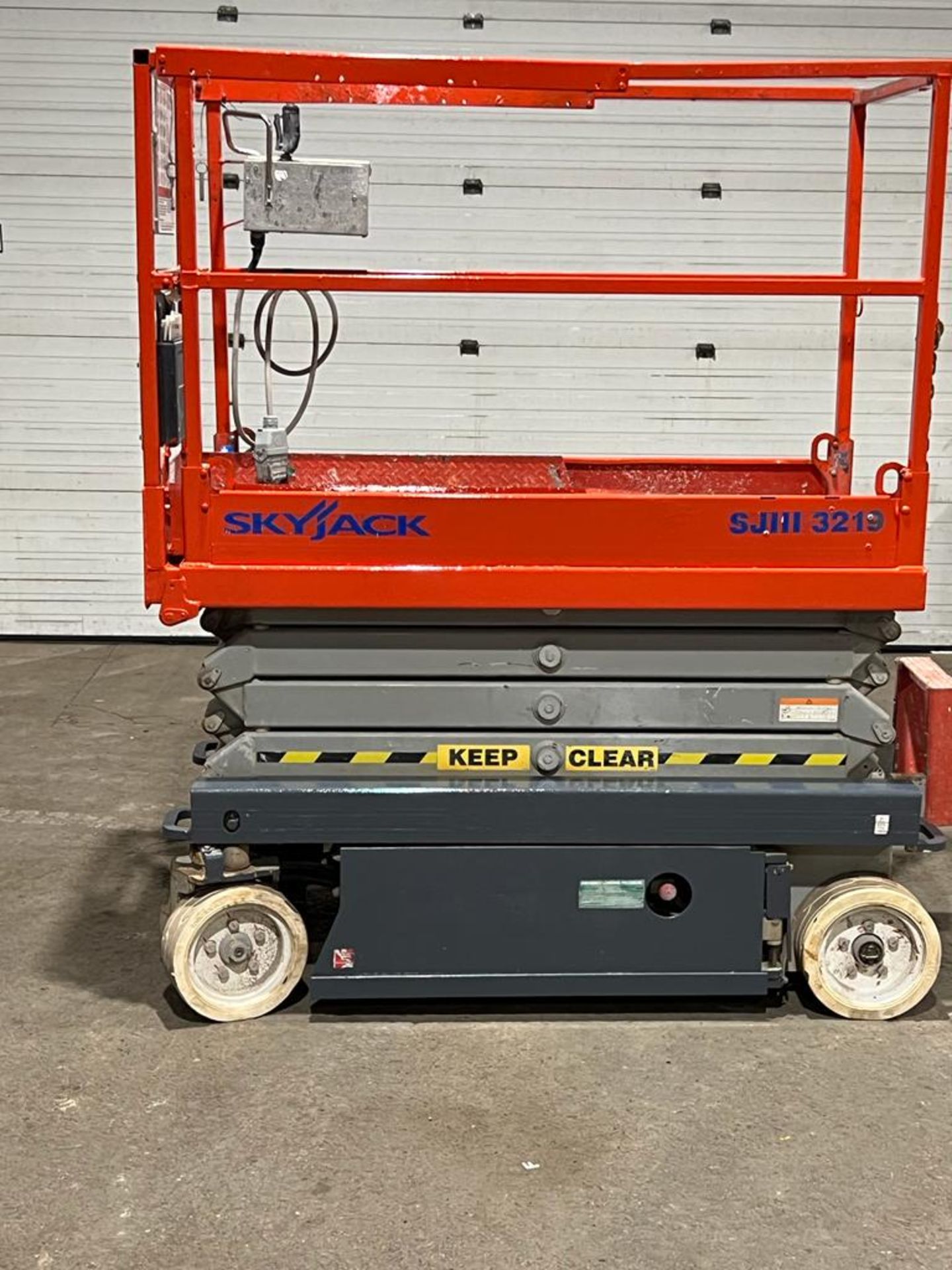 2013 SkyJack III Electric Scissor Lift model 3219 - 19 feet lift, 32 inch width deck with pendant - Image 2 of 5