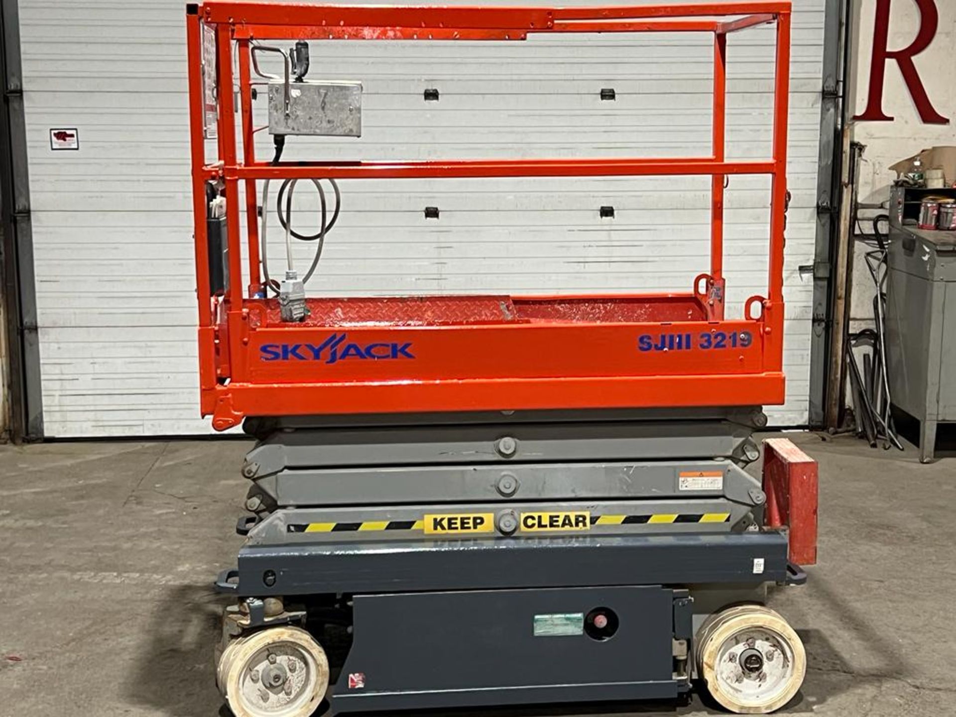 2013 SkyJack III Electric Scissor Lift model 3219 - 19 feet lift, 32 inch width deck with pendant - Image 3 of 5