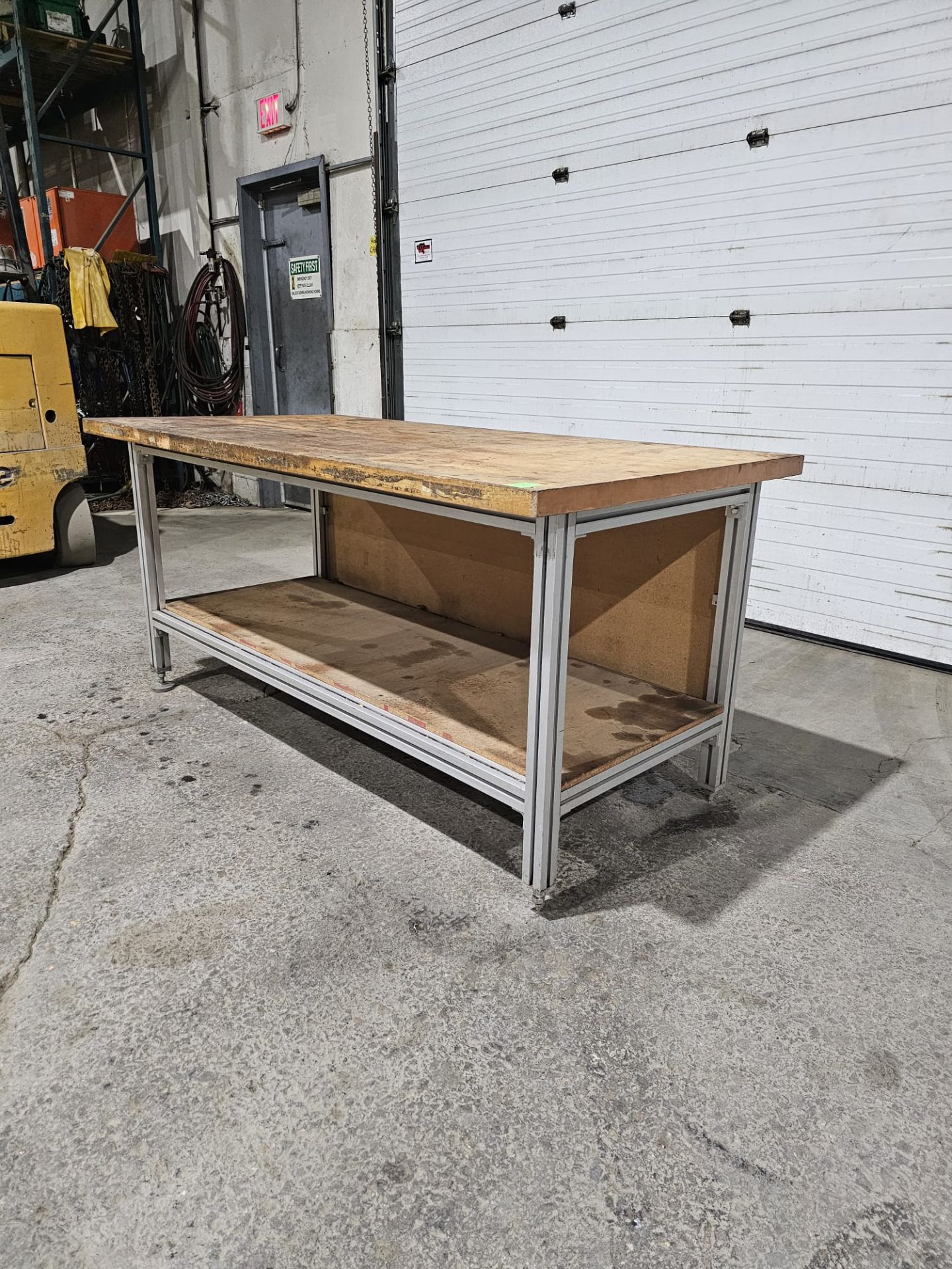 Table 36" x 72" x 34.5"h bottom shelf: 24" w x 69" - Aluminum frame with wooden top - Image 4 of 6