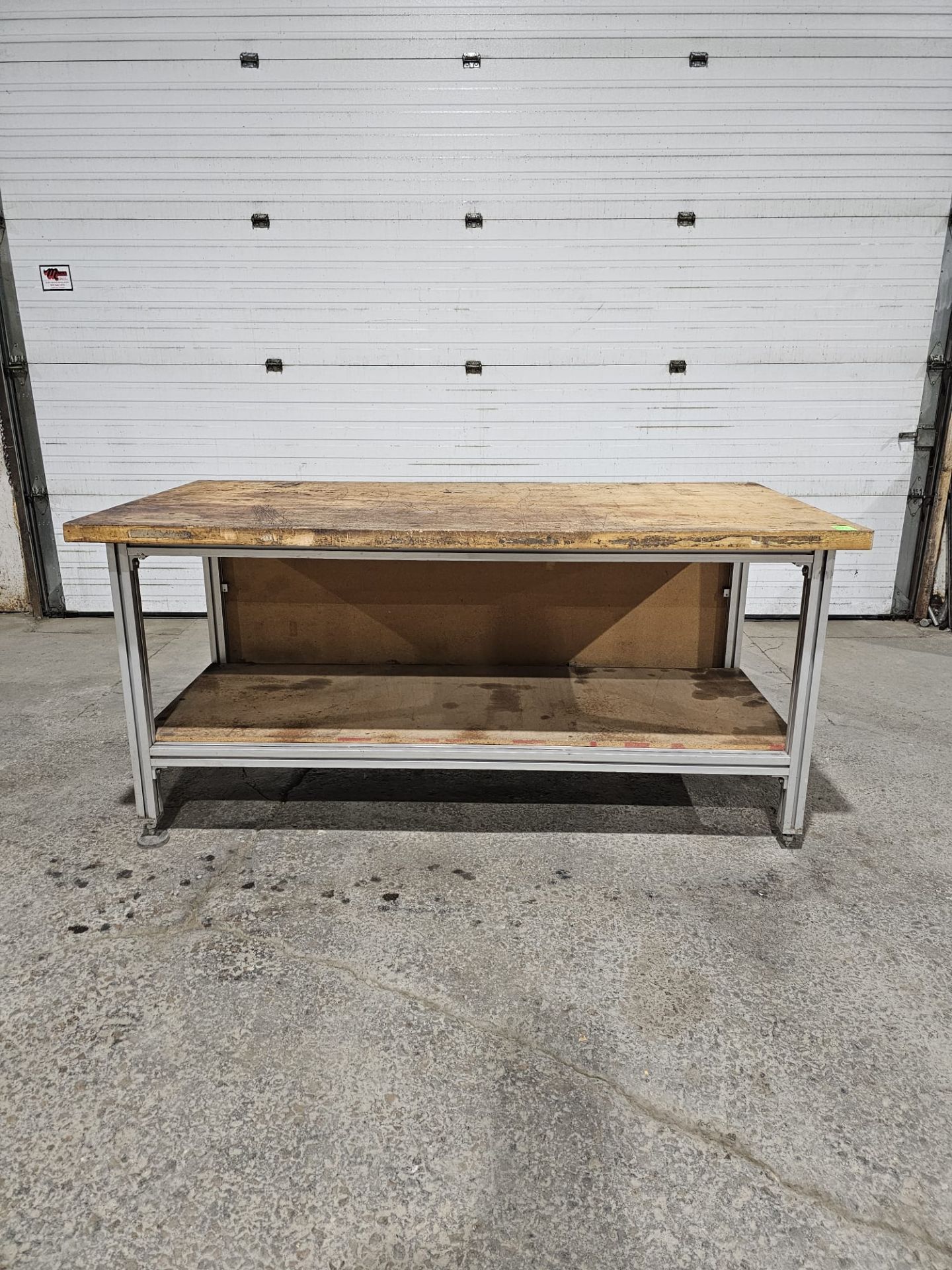 Table 36" x 72" x 34.5"h bottom shelf: 24" w x 69" - Aluminum frame with wooden top - Image 2 of 6