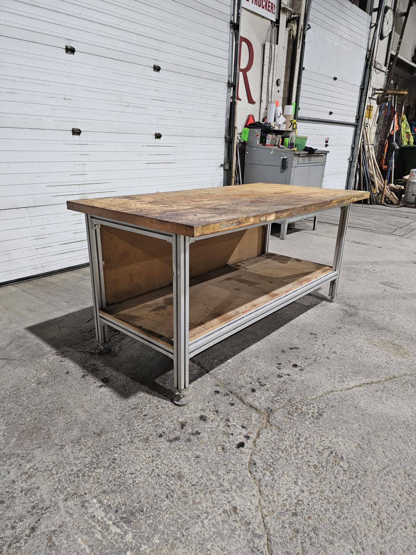 Table 36" x 72" x 34.5"h bottom shelf: 24" w x 69" - Aluminum frame with wooden top - Image 3 of 6