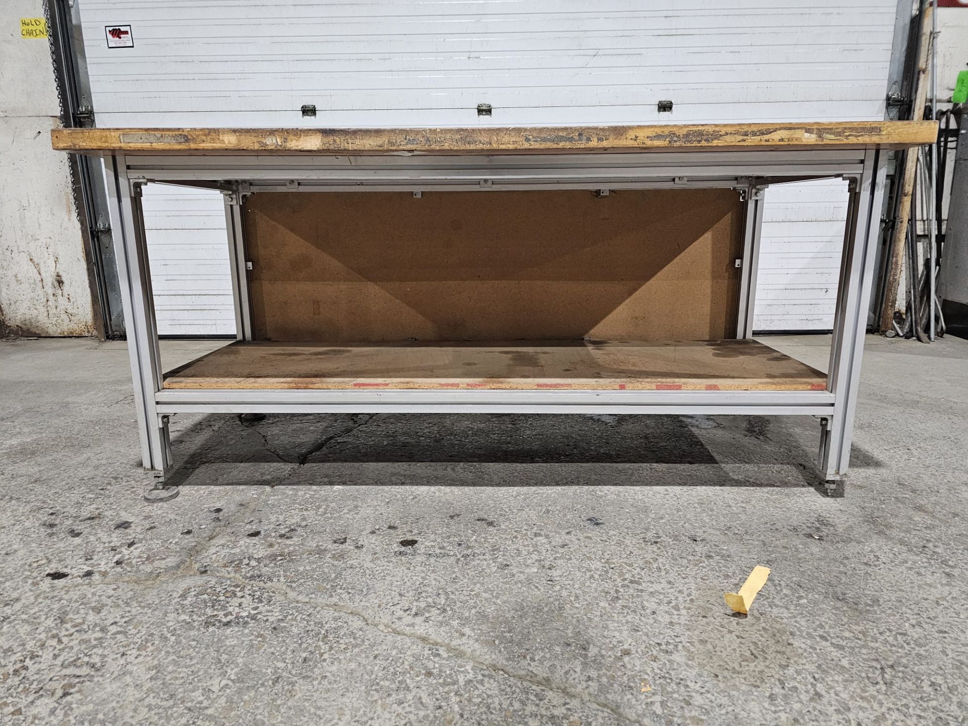 Table 36" x 72" x 34.5"h bottom shelf: 24" w x 69" - Aluminum frame with wooden top