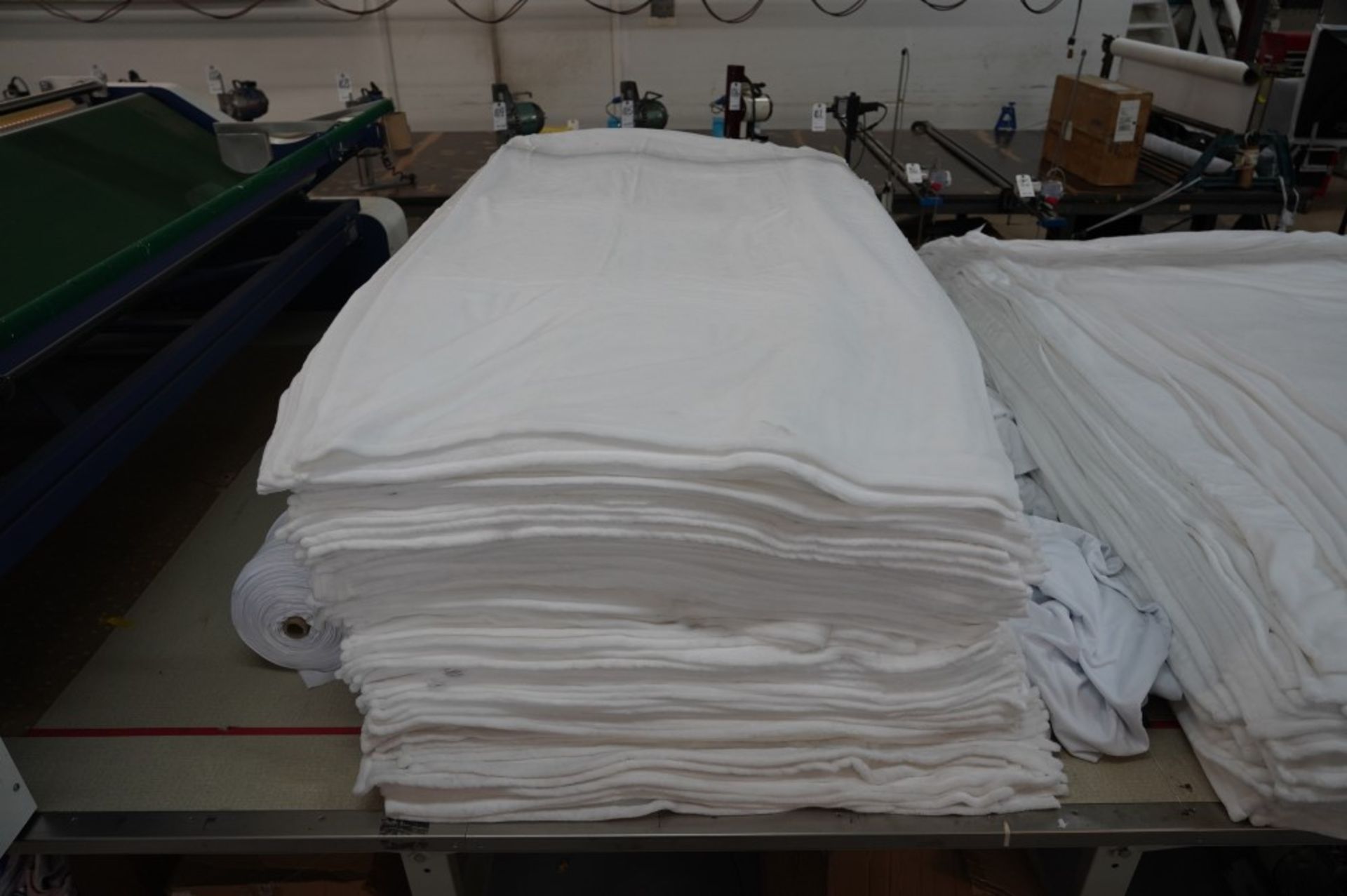 (2) Stacks of Blankets and (2) Stacks of Clothe Material, (1) Fleece White 60'' x 80'' , (1) Fleece - Image 3 of 7