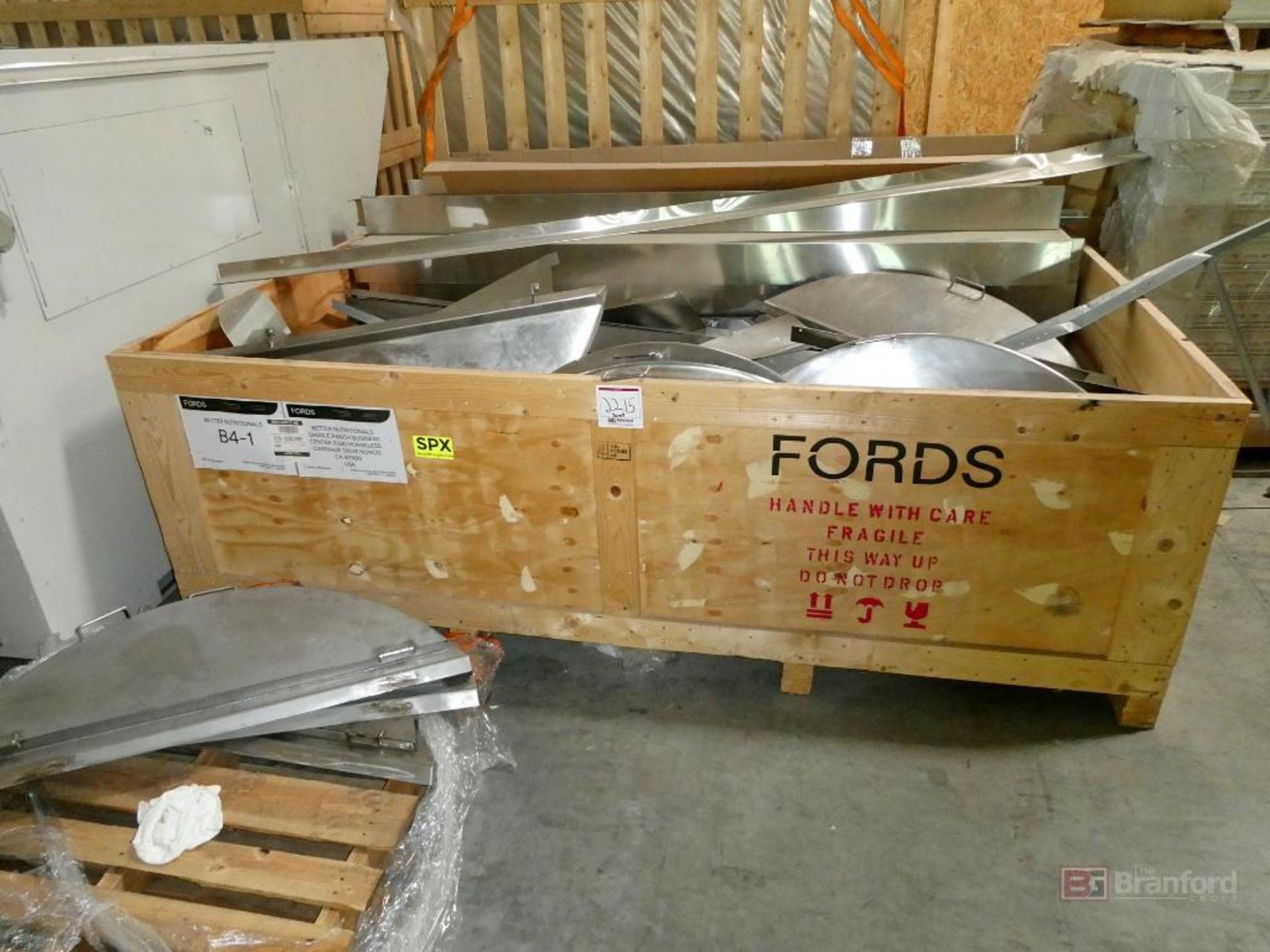 Crate of Stainless Steel Left Over Parts to the Fords Packaging Machines