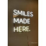 (2) Smiles Made Here. Sign