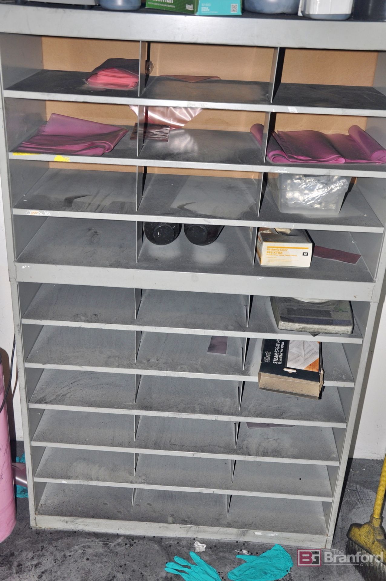 30-slot shelving unit & contents